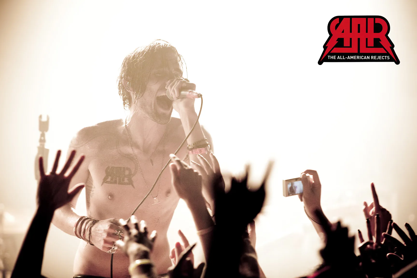 Tyson Ritter of The All American Rejects singing over the crowd at On the Rox